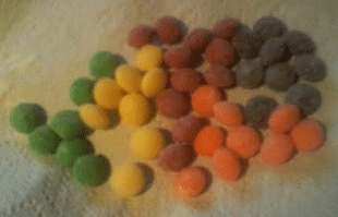 sour skittles arranged by color
